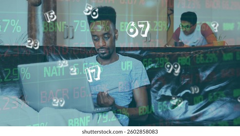 Image of numbers changing and financial data processing over man using laptop online shopping. global business and finance concept digitally generated image.using