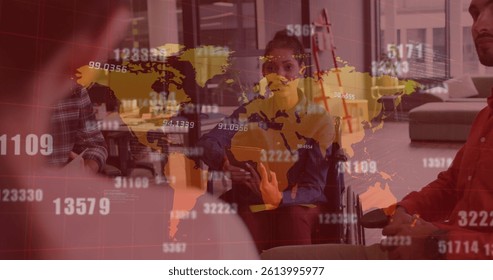 Image of numbers changing and world map over businesswoman in wheelchair in office. global business and data processing concept digitally generated image.
