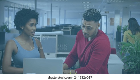 Image of numbers and data processing over diverse business people in office. Global business, finances, computing and data processing concept digitally generated image.