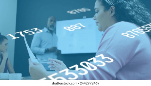 Image of numbers processing over diverse business people. Global business, finances, computing and data processing concept digitally generated image