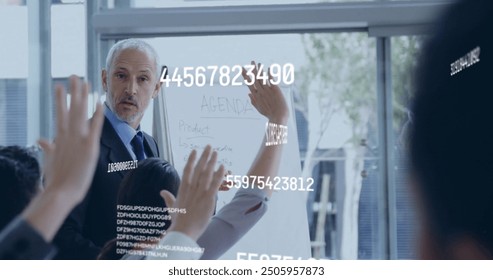 Image of numbers processing over diverse business people in office. Global finance, business, connections, computing and data processing concept digitally generated image.