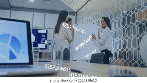 Image of numbers processing over diverse business people in office. Global finance, business, connections, computing and data processing concept digitally generated image.
