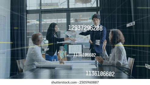Image of numbers processing over diverse business people in office. Global finance, business, connections, computing and data processing concept digitally generated image.
