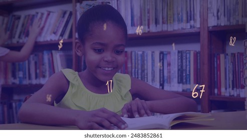 Image of numbers and symbols floating over african american girl studying in library at school. School and education concept - Powered by Shutterstock