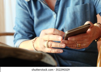 Image Of Older Woman Using Smart Phone