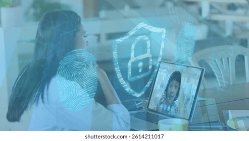 Image of online security padlock over biracial businesswoman on laptop image call. business, finance and data processing concept digitally generated image.
