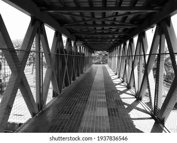 A Image Of A Overhead Bridge With Symmetrical Metal Beams - Empty Pedestrian Bridge In Bengaluru During Lockdown Before Covid-19 Second Wave, Life Before Oxygen Crisis And Bed Shortages In The City.