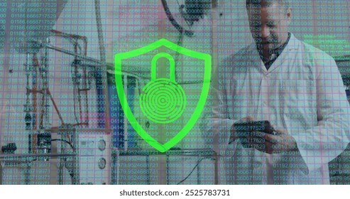 Image of padlock and data processing over caucasian male scientist using tablet. Global cyber security, science, computing and data processing concept digitally generated image. - Powered by Shutterstock