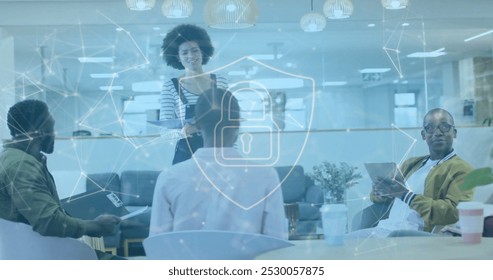 Image of padlock and data processing over diverse business people in office. Global cyber security, business, connections, computing and data processing concept digitally generated image.
