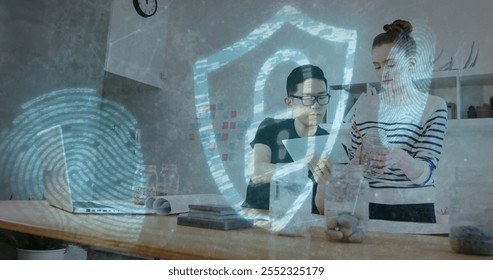 Image of padlock and data processing over diverse business people in office. Global finance, business, connections, computing and data processing concept digitally generated image.