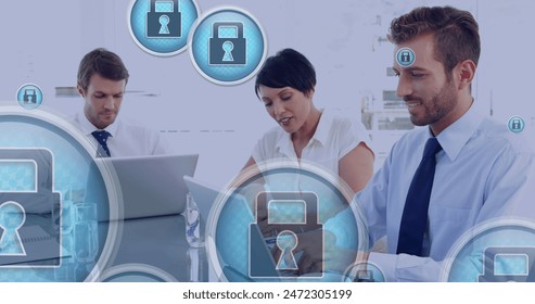 Image of padlock icons processing over diverse people in office. Global business, finance, digital interface and data processing concept digitally generated image.