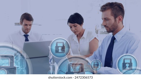 Image of padlock icons processing over diverse people in office. Global business, finance, digital interface and data processing concept digitally generated image. - Powered by Shutterstock