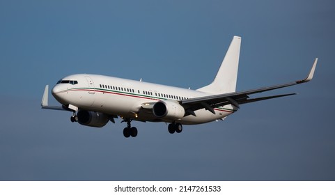 Image Of Passenger Plane Landing In Airport Afternoon At Sunny Day