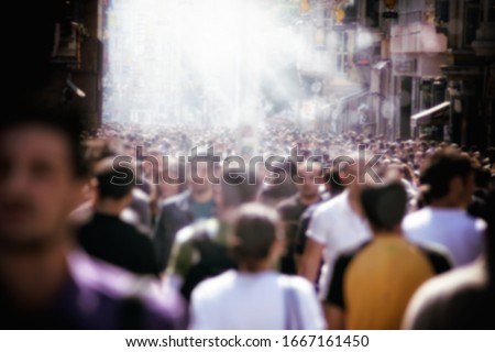 an image of people walking in rush hour
