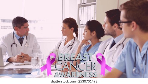 Image of pink breast cancer ribbon over group of discussing doctors. breast cancer positive awareness campaign concept digitally generated image. - Powered by Shutterstock