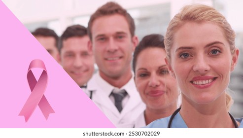 Image of pink breast cancer ribbon over group of smiling doctors. breast cancer positive awareness campaign concept digitally generated image. - Powered by Shutterstock