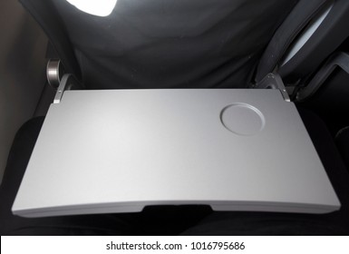 An Image From The Plane. Openable Tray In Front Of The Seat.