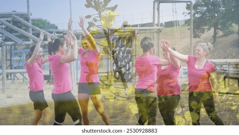 Image of plants over diverse women at obstacle course high fiving. Global sport, health, fitness and digital interface concept digitally generated image. - Powered by Shutterstock