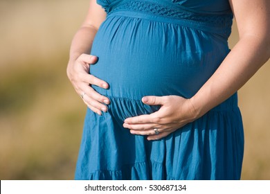 Image of pregnant woman in outdoor nature
