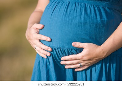 Image of pregnant woman in outdoor nature