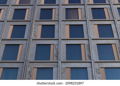 Image Presents Modern Facade With Big Windows And Metal Framing. No Reflection In The Windows. Curtain In Windows. No People. Pattern And Design. Unrecognizable Building. Architecture Detail. Close Up