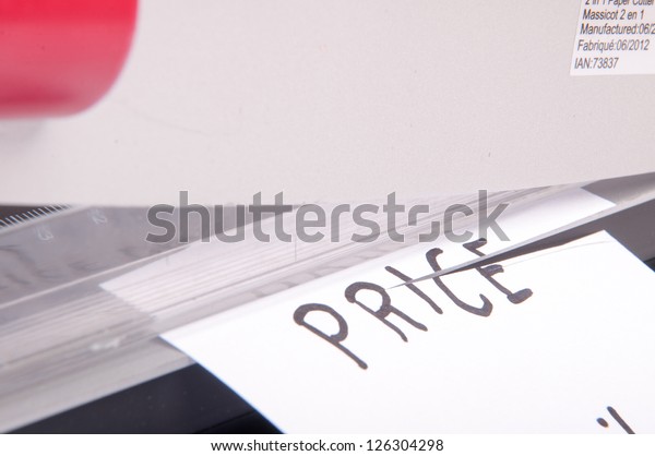 An image of price\
cuts with guillotine