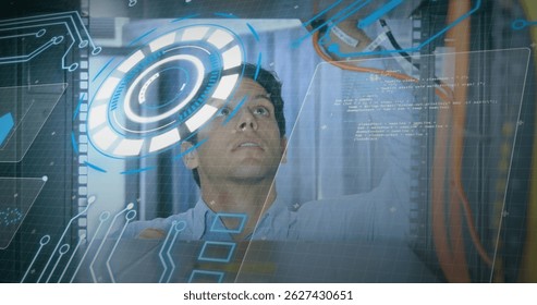 Image of processing circle and data over caucasian man checking servers. Network, data processing and technology concept digitally generated image.