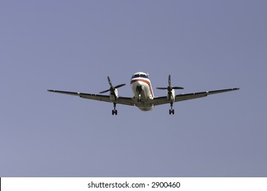 Image Of A Prop Plane From The Front At LAX.  Either Landing Or Taking Off.