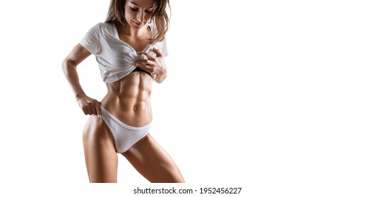 Image of a pumped up abs. Beautiful sportive woman posing in studio on a white background. Fitness, bodybuilding, aerobics concept. Mixed media