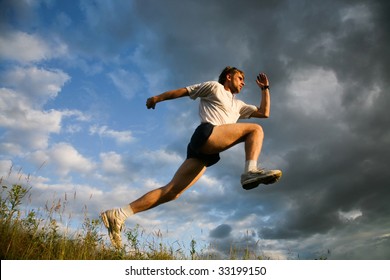 Image of pumped man training on open air - Shutterstock ID 33199150