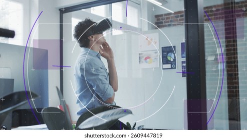 Image of purple light trails with hexagons over businessman wearing vr headset in office. global technology, connections and digital interface concept digitally generated image.