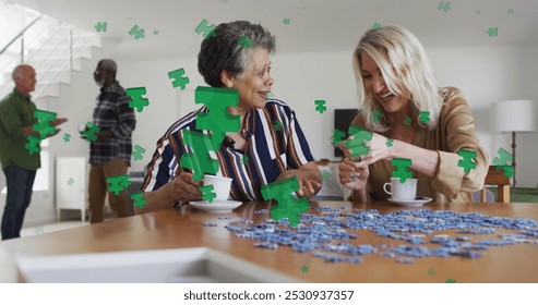 Image of puzzle over diverse group of seniors talking. senior home hangout and digital interface concept digitally generated image. - Powered by Shutterstock