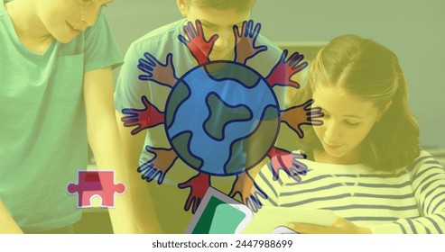 Image of puzzle pieces and globe over diverse schoolchildren using tablet. autism awareness month and celebration concept digitally generated image. - Powered by Shutterstock