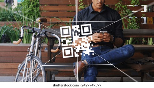 Image of qr code over biracial man using smartphone. Global business, finances and digital interface concept digitally generated image.