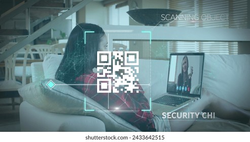 Image of qr code security check over woman using laptop on image call. Digital interface global connection and communication concept digitally generated image. - Powered by Shutterstock - Get 15% off with code: PIKWIZARD15