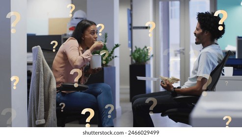 Image of question marks over african american coworkers talking while having food at office. Digital composite, multiple exposure, confusion, puzzle, break, communication and working concept. - Powered by Shutterstock