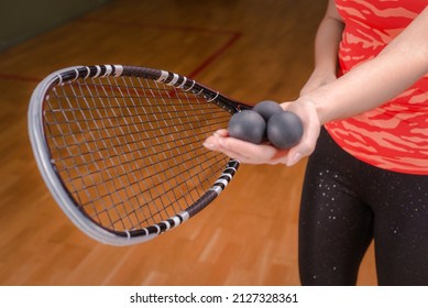 Image of racket and three squash balls. Sports concept. Mixed media
