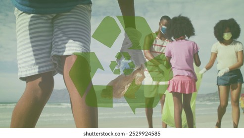 Image of recycling icon over african american family picking waste on sunny beach. healthy and active beach holiday concept digitally generated image. - Powered by Shutterstock