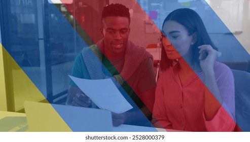 Image of red, blue and yellow stripes over diverse business people talking. Ukraine crisis, communication, business, finance and data processing concept digitally generated image. - Powered by Shutterstock