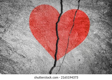 Image of a red heart on cracked plaster - Shutterstock ID 2165194373