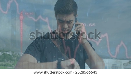 Image of red line financial data processing over biracial man on smartphone. Global computing, digital interface and data processing concept digitally generated image.