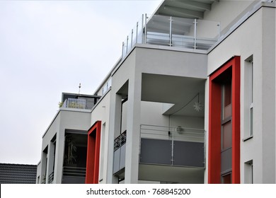 An Image Of A Residential Home With Modern Facade Painting, Exterior Shot