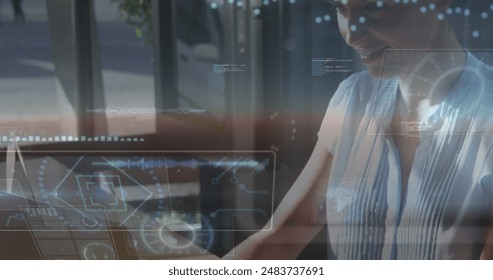 Image of round scanners and data processing over caucasian woman using laptop at cafe. Computer interface and business technology concept