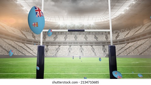 Image of rugby balls coloured with flag of fiji at stadium. sport and competition concept digitally generated image. - Powered by Shutterstock