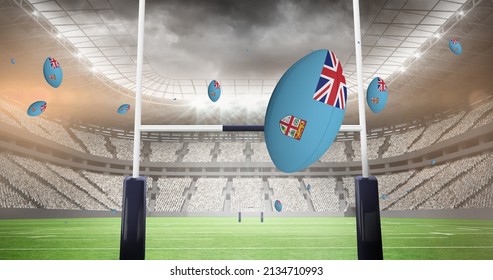 Image of rugby balls coloured with flag of fiji at stadium. sport and competition concept digitally generated image. - Powered by Shutterstock