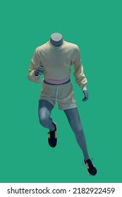 Image of a running female display mannequin wearing sportswear isolated on a green background - Shutterstock ID 2182922459