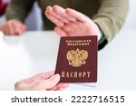 Image of Russian internal passport. Concept of renunciation (relinquishment) of Russian citizenship by reason of military action in Ukraine and migration of citizens from Russia to other countries. 