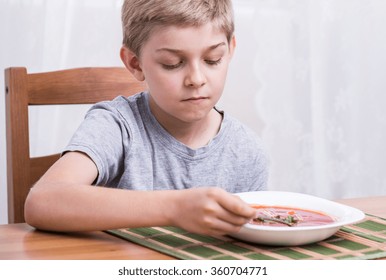 Image Of Sad Schoolboy With No Appetite