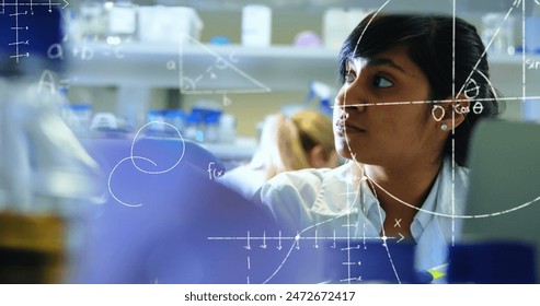 Image of scientific data processing over biracial female scientist. Science, research, computing and data processing concept digitally generated image.