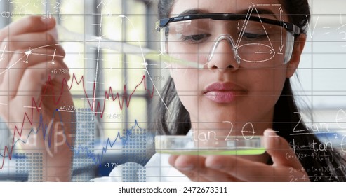 Image of scientific data processing over biracial female scientist. Science, research, computing and data processing concept digitally generated image.